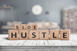 What is a Side Hustle - Wooden Blocks spelling out 'side hustle'