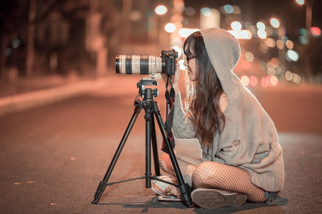 Woman Taking Photos At Night For Stock Photo Side Hustle